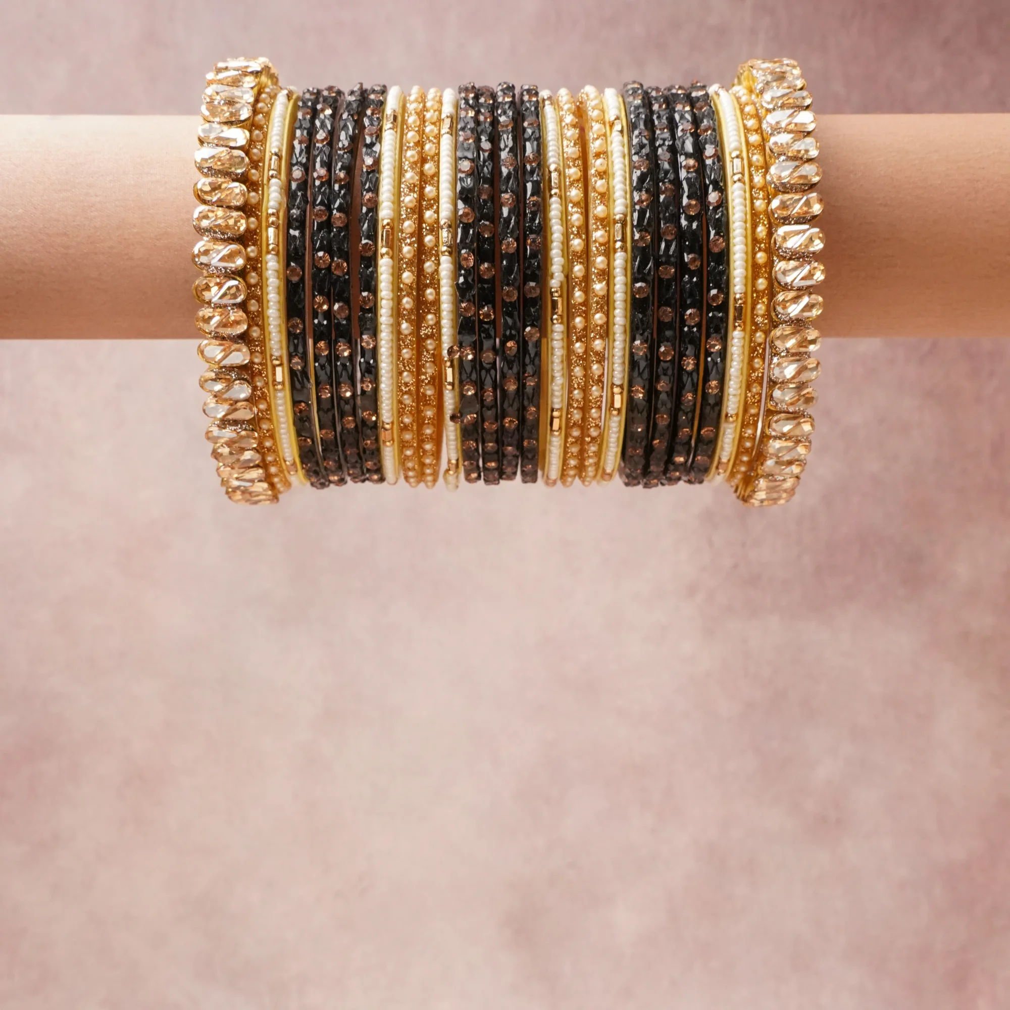 A grounding deep green forms the heart of the set, while touches of Warm Gold, Champagne, Cream, Pale Yellow add charm.

A thoughtful composition of Gold-Toned Metal, Glass, Zirconia, Faux Pearls, designed to feel complete without being heavy.
Each element layers seamlessly, creating a look that is refined, wearable and quietly striking.